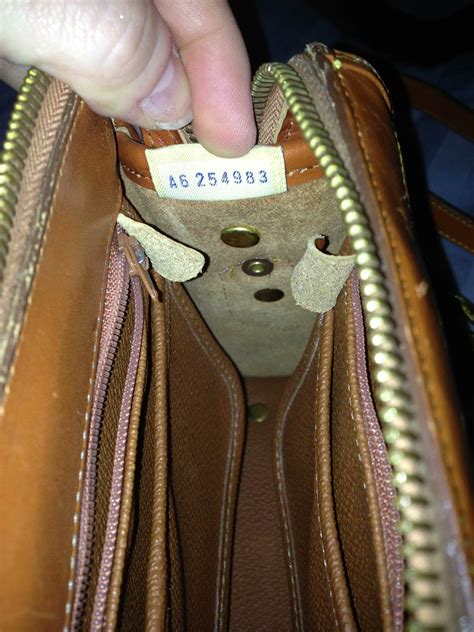 dooney and bourke wallet serial number